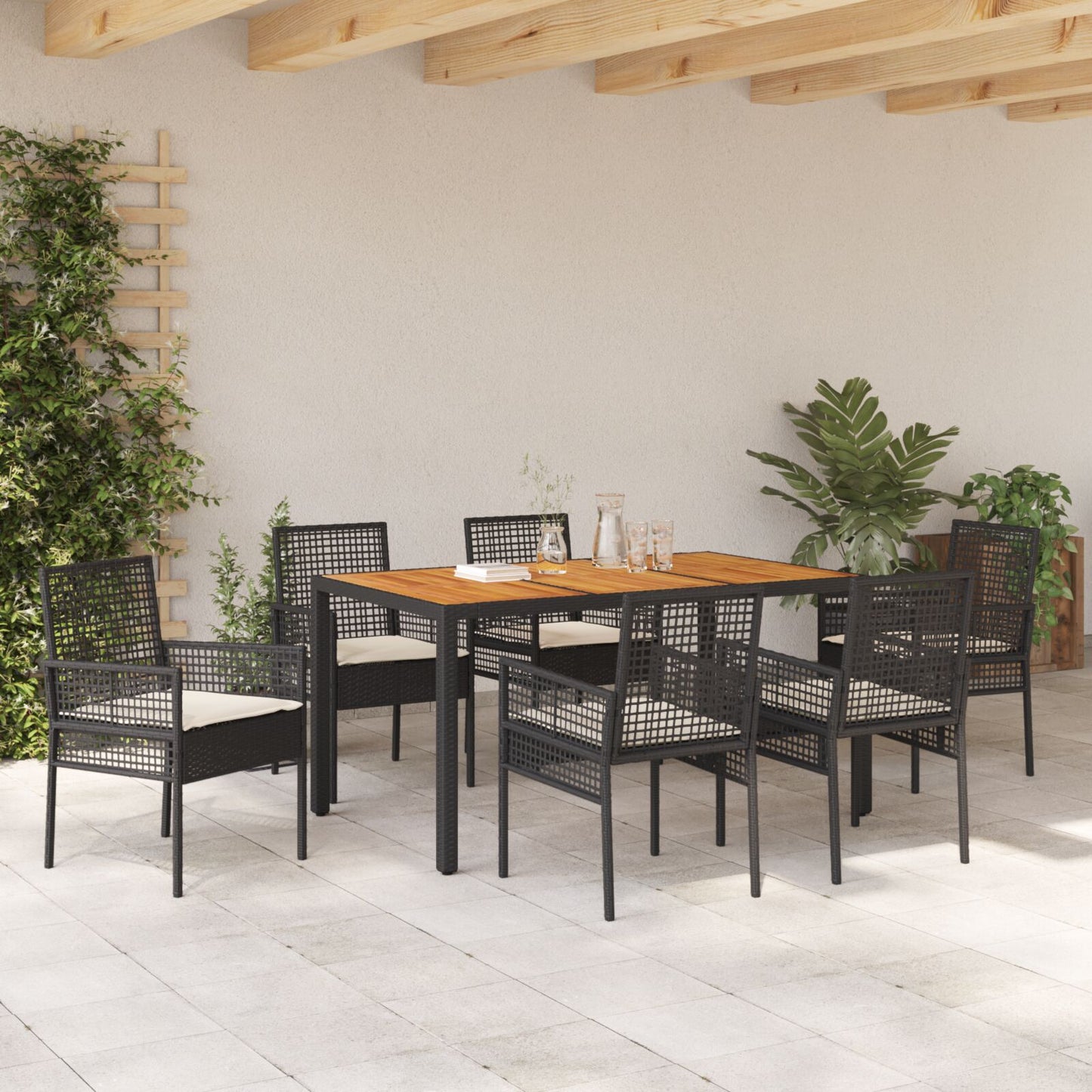 7-teilige Essgruppe für den Garten mit Kissen in Schwarz aus Poly-Rattan